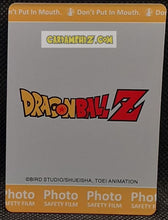 Charger l'image dans la galerie, Carte Dragon Ball Z + Polaroid First Edition V2 Part 2 n° SCR-006 (2024) Kabao tenshinhan dbz prisme foil holo secrete cardamehdz point com mehdz atout